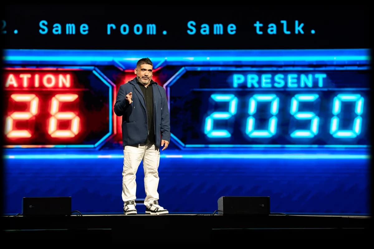 Miguel Carrasco speaking in front of screens reading 2026 and 2050